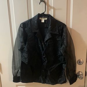 Vintage blouse with lace vest and see three long sleeves .